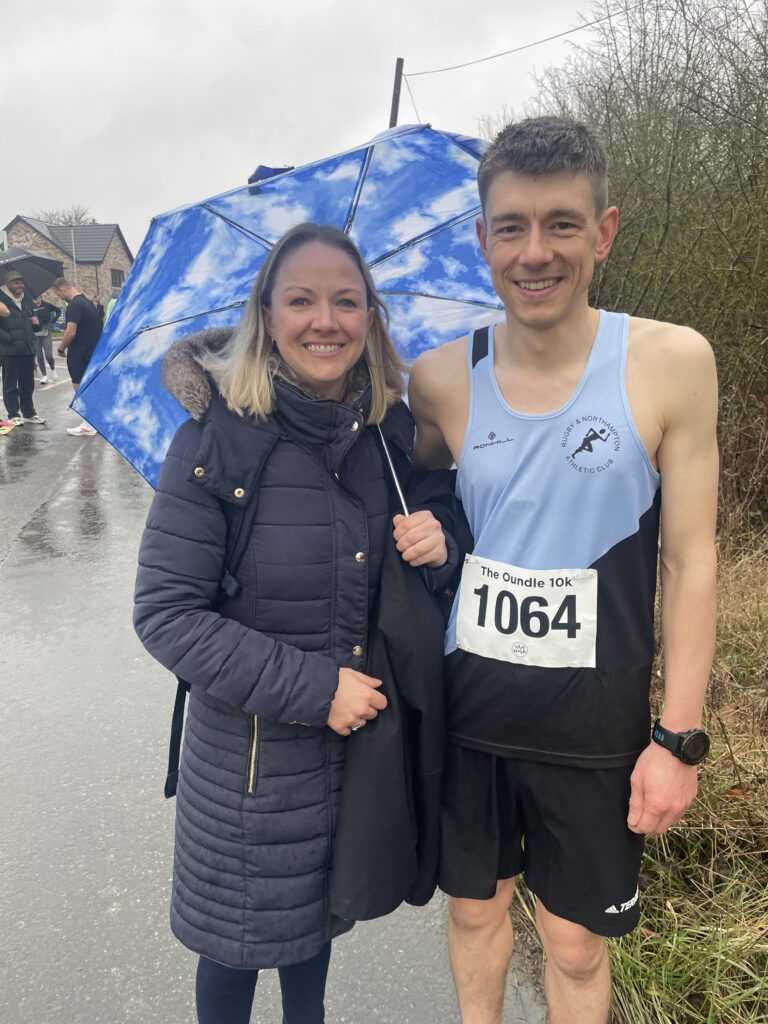 Runner and partner before the start of the Oundle 10k race